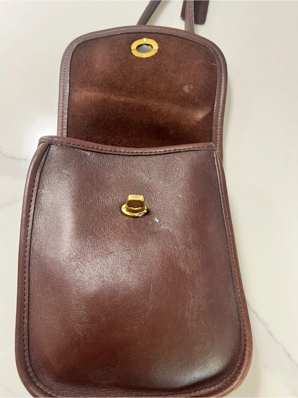 Vintage Coach Brown Leather Crossbody Bag with Gold Hardware.